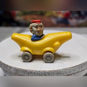 Vintage Richard Scarry Busy World Monkey in Banana Car McDonalds 1994